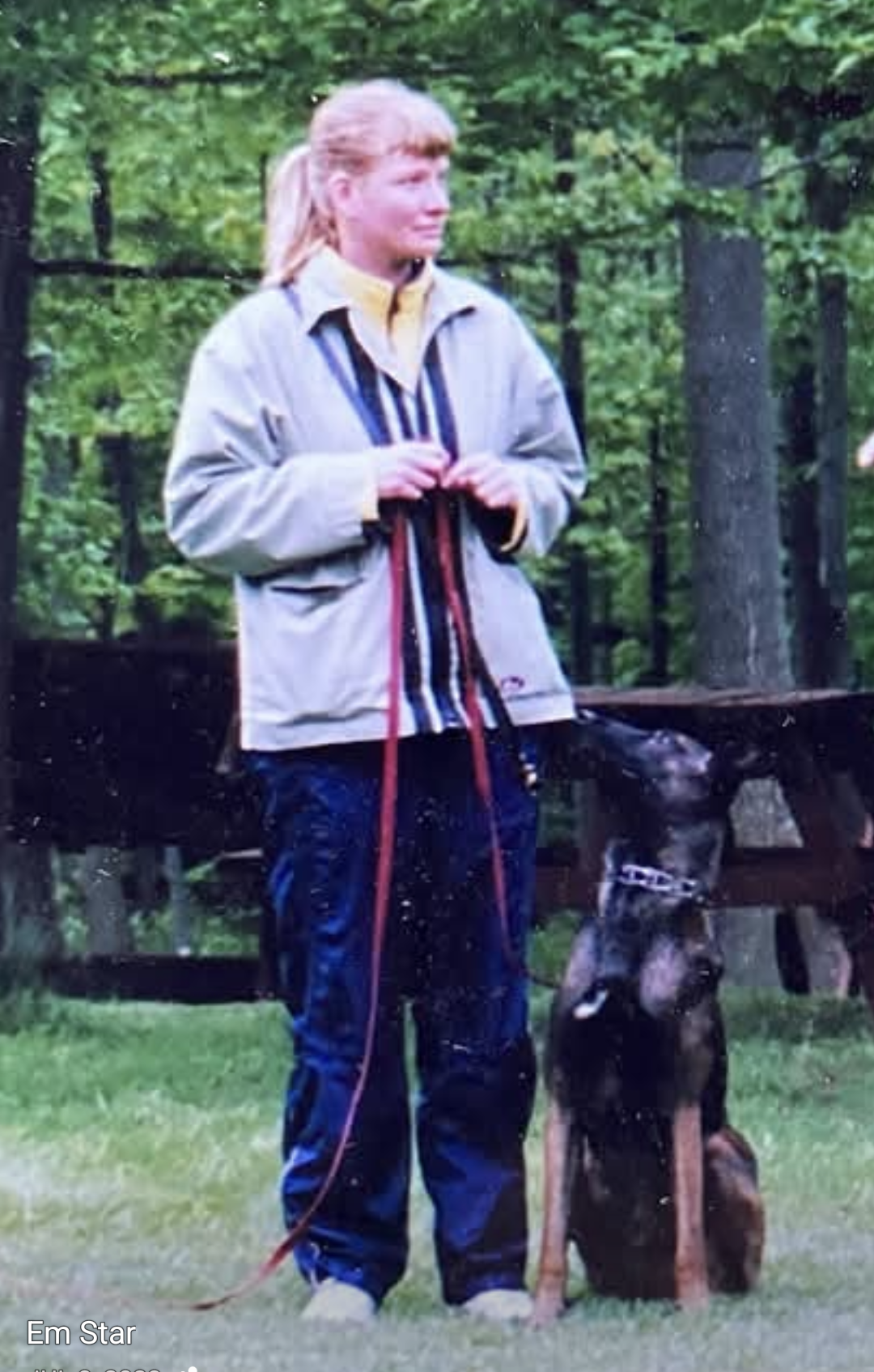 Photo of women with german shepard dog in training